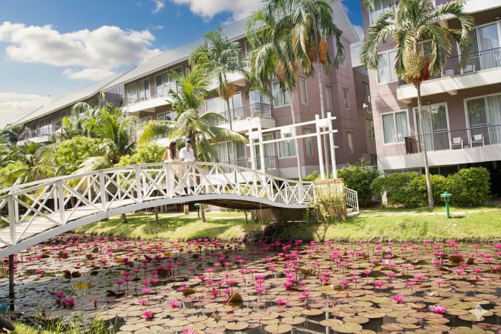 The Leela Resort & Spa Pattaya's signature white bridge over the lily pond